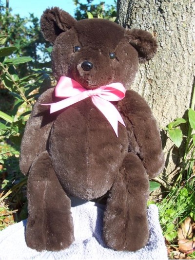 Penelope | Handmade teddy bear with feminine ribbon and chocolate colored fur. Custom text on foot